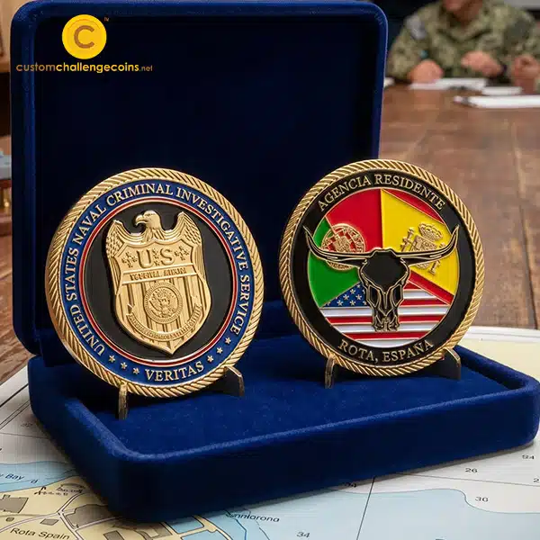 Naval Criminal Investigative Service and Rota Spain challenge coins displayed together